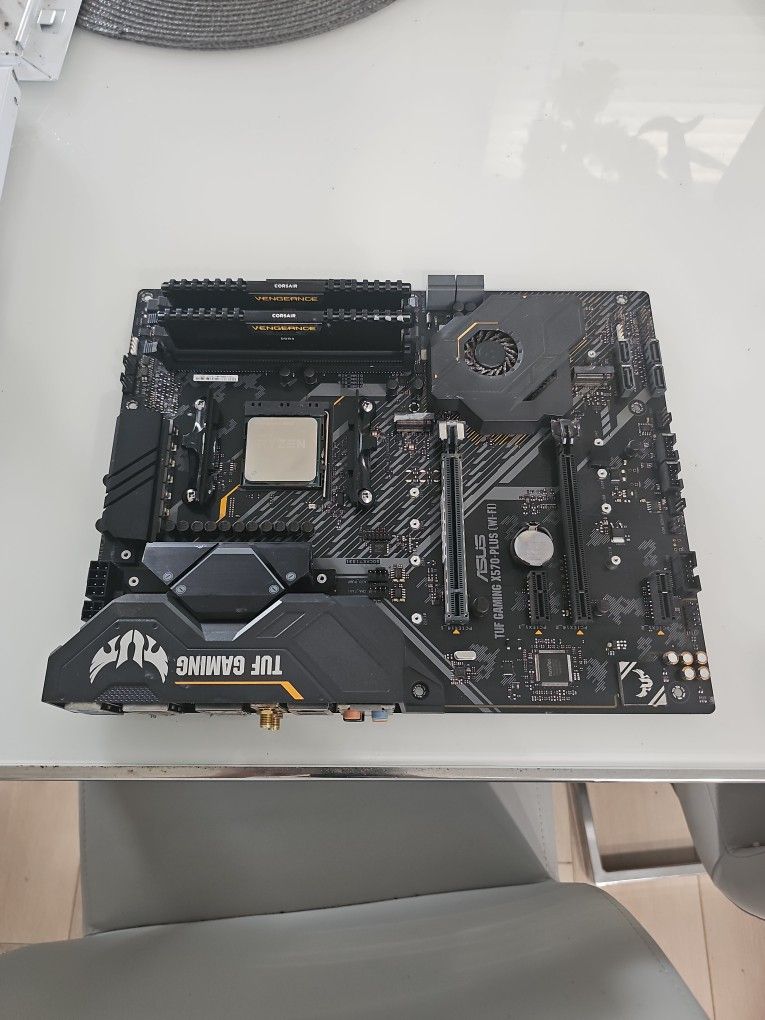 ASUS TUF X570-PLUS GAMING Motherboard (AM4) w/ CPU (Ryzen 7 5800x) and 32gb of memory.