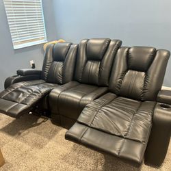 Black Dual Power Reclining Sofa With Loaded Features