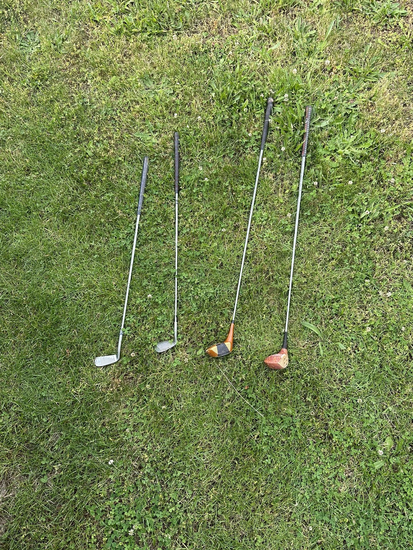 4 Golf Clubs 