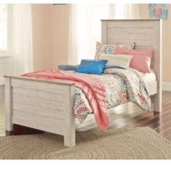 1 Ashley Furniture Twin Bed + 1 Ashley Furniture Queen Bed 