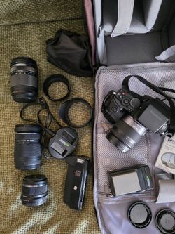 Camera, lenses, batteries and bag