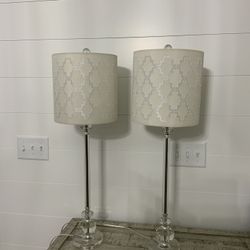 2 crystal column table lamps.  Burlap linen fabric shade with cutout pattern.  32" high x 10" wide overall.