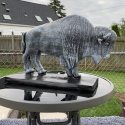 The old gray buffalo statue