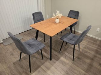 Brown Table with metal legs and 4 Gray Velvet Chairs