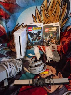 White Nintendo Wii Console with 2 Games