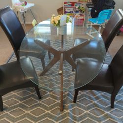 sell 1 year old oval dining table- pretty new