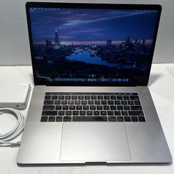 Apple MacBook Pro Touch Bar (15-inch 2019 ) Core i7 , 16 GB Ram , Storage 256 SSD, Comes With Charger 