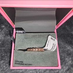 0.05 Carat T.W. Diamond Stackable Band in 10K Rose Gold with Garland of Mini Hearts
