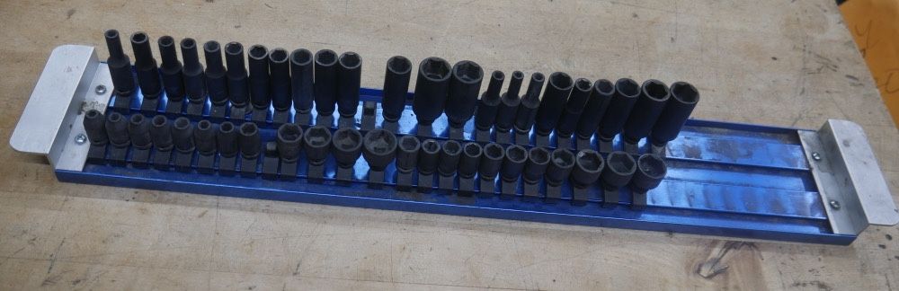 Lot 46 1/4  impact sockets P expert by Mac Tools with Stand . used .tested. in a good working order. missing 2 sockets . 