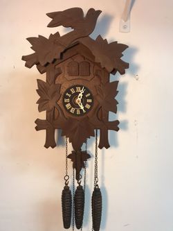 Cuckoo clock with music man