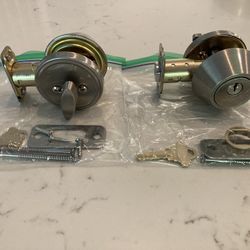 two Schlage single cylinder deadbolts 