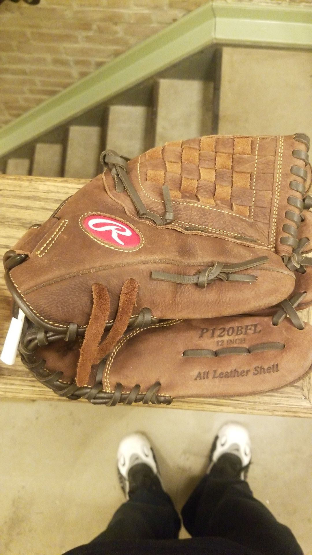Leather Rawlings 12 Inch Left handed Baseball Glove. Get somebody into this glove and onto the field lol. All leather never used