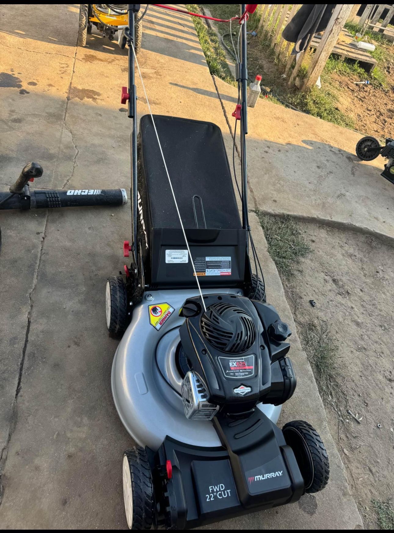 Murray 22 in. 140 cc Briggs & Stratton Walk Behind Gas Self-Propelled Lawn Mower with Front Wheel Dr