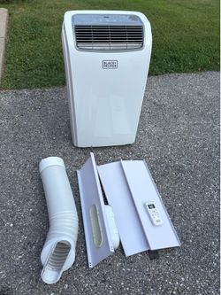 Portable Ac w/all the accessories including remote control. Like new. Works perfectly.