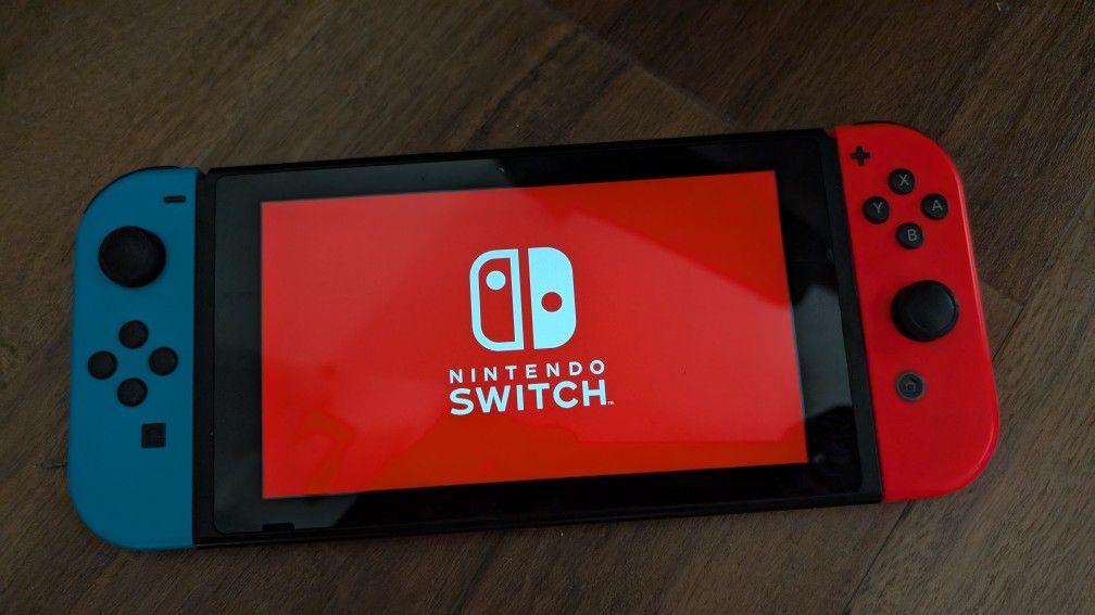 Nintendo Switch + 2 Games