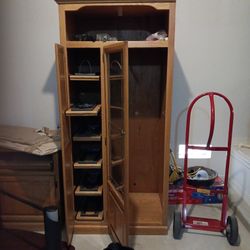 Entertainment  With Glass Doors And Shelves Wih Pull Out Drawer  For DVD,  And TV 50",and  Carpets Larger 