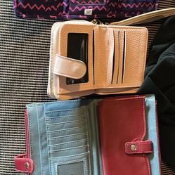 Three Wallets And Four Keychains