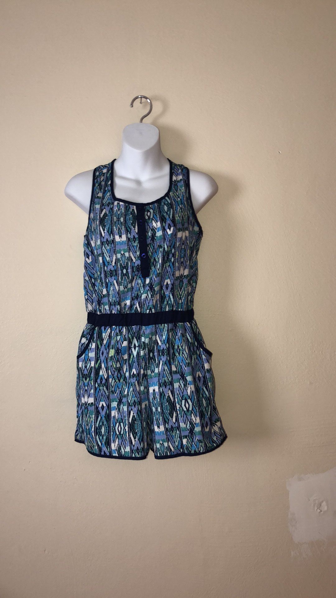 Kids size 14-16 silky romper with pockets. Like new condition