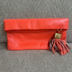 India Hicks Carmen Clutch bright orange coral color