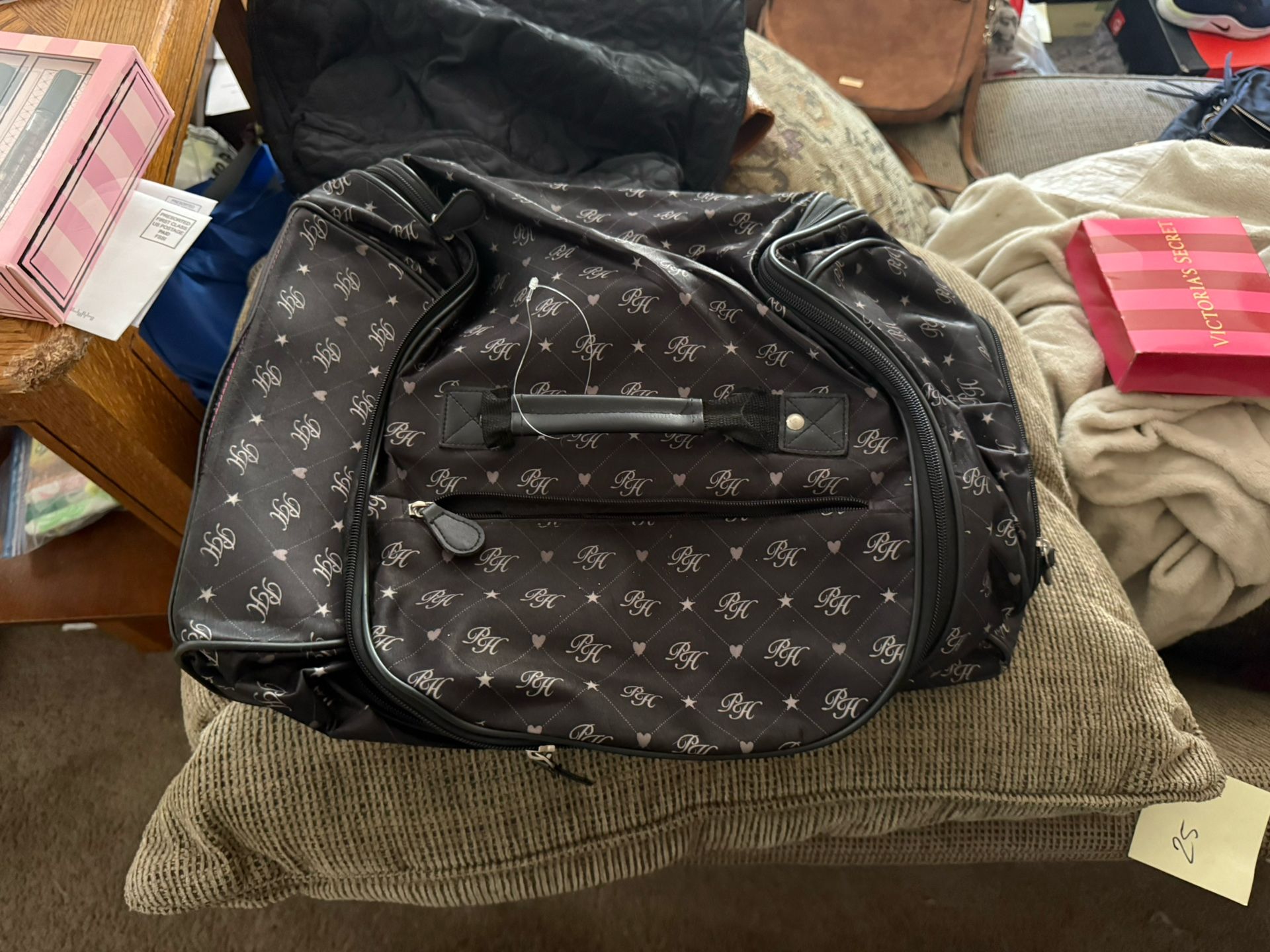 Paris Hilton Rolling Carry On Travel Bag