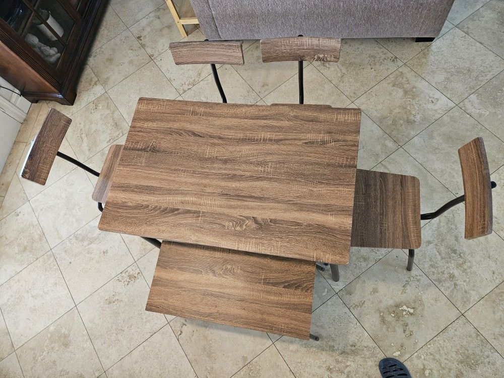 table with 4 chairs and bench