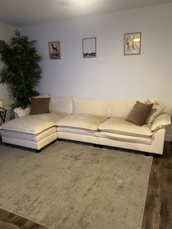 Couch with moveable ottoman