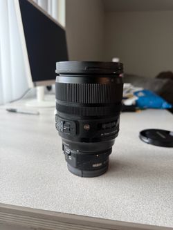 Sigma 24–70mm f/2.8 EX DG HSM for Canon EF (with Sony E Metabones adapter included)