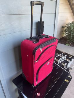 Great deal good condition Red 20” length suitcase 🧳 luggage on wheels 🛞
