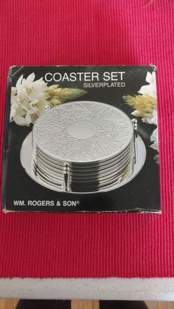 William Rogers 7 piece silver plated coaster set
