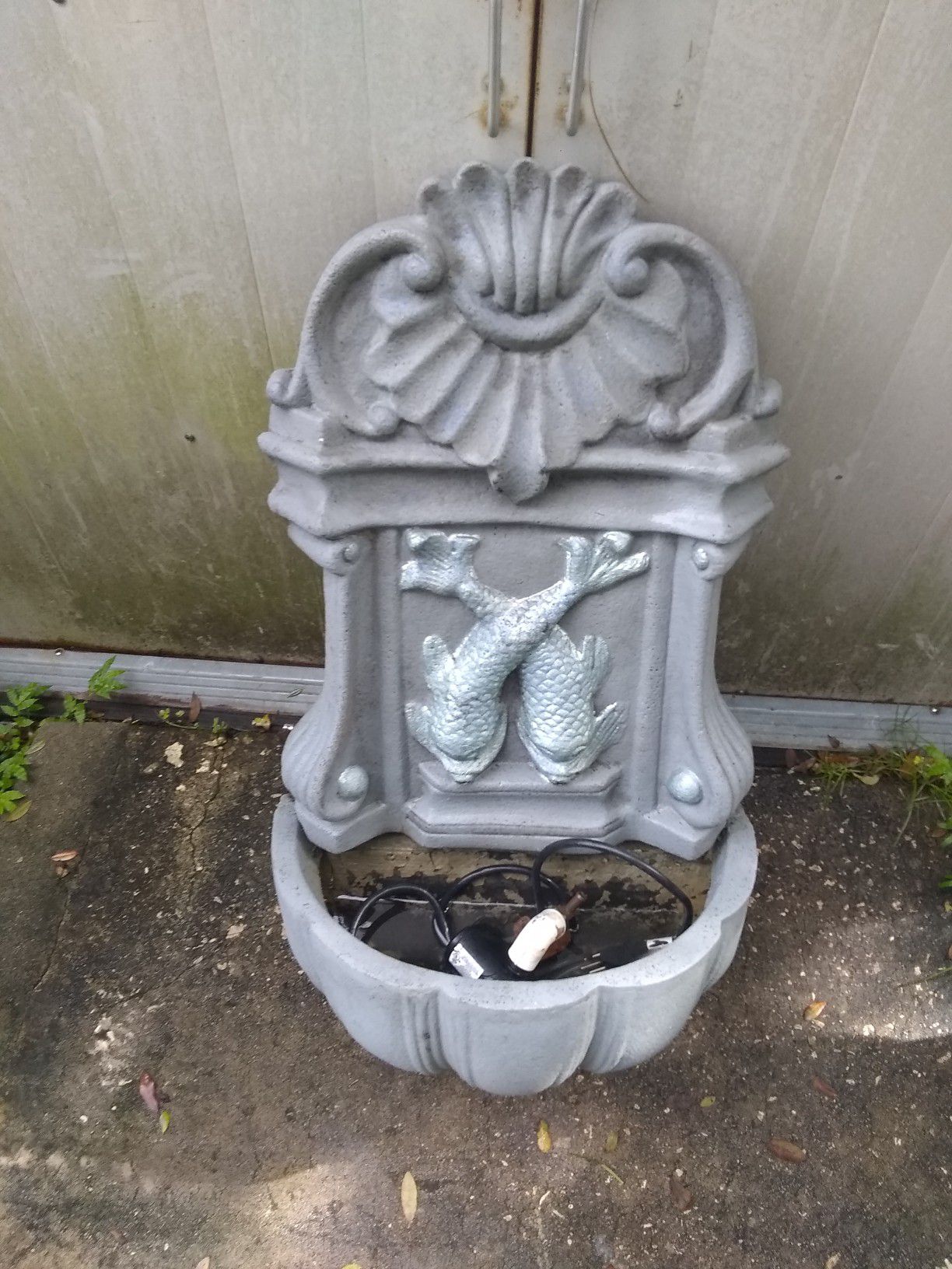 Fish fountain with a working pump