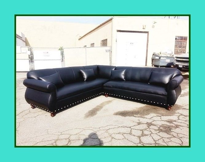 new 9x9 ft "Black leather" sectional couches