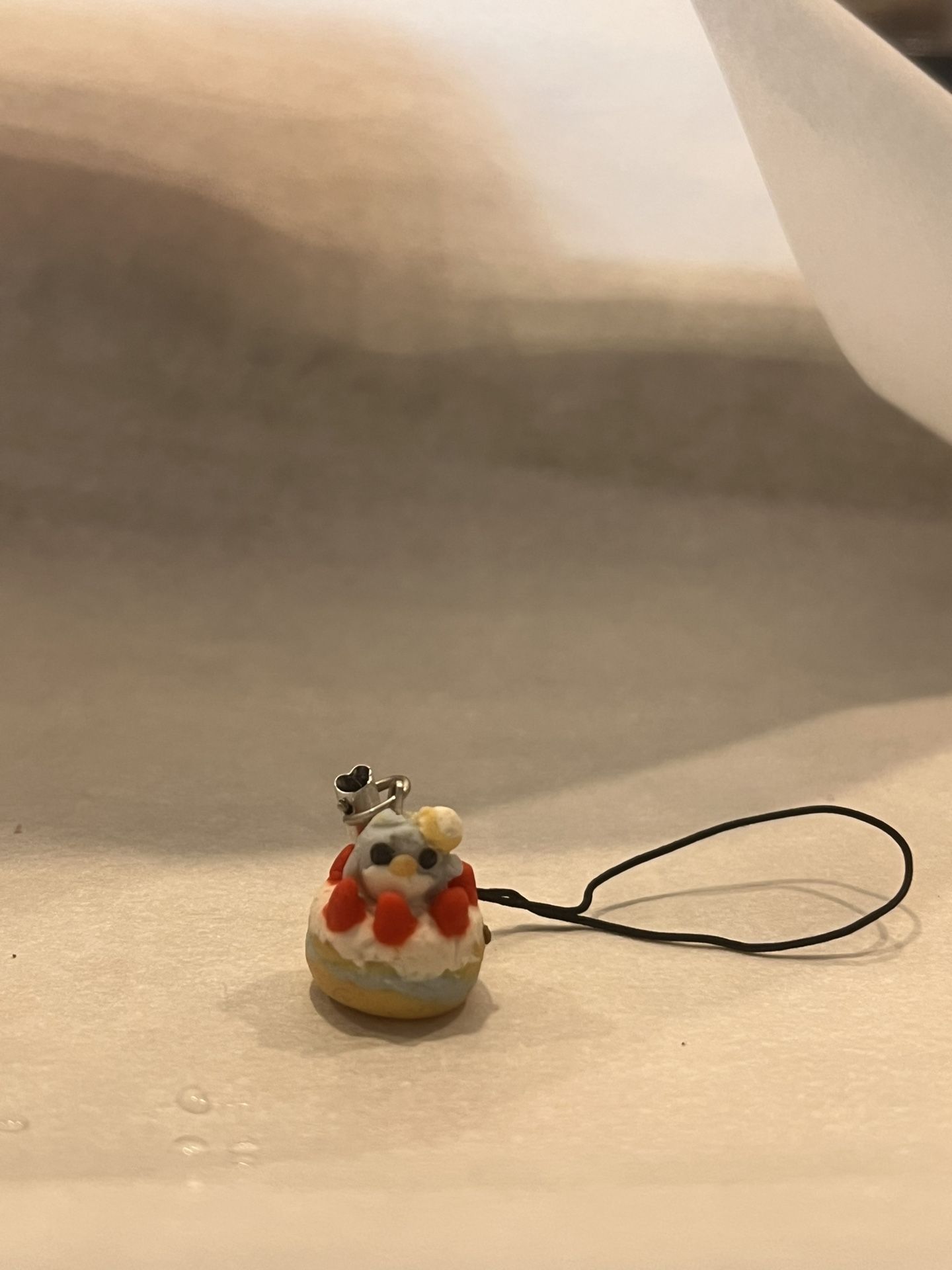 Strawberry Cake With A Penguin On Top Made With Clay