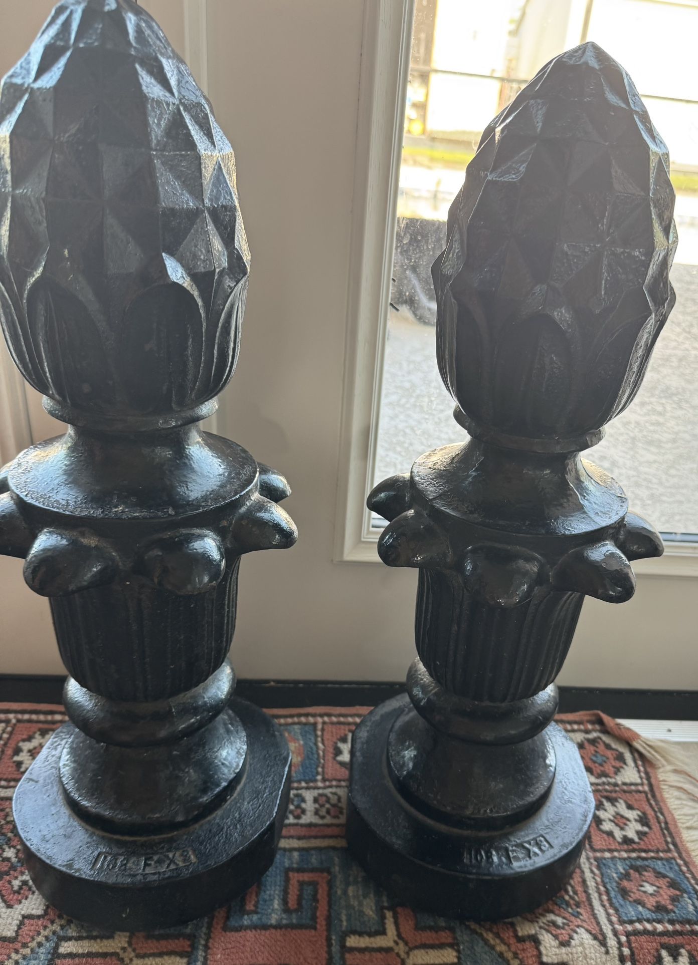 Pair of Painted Black Cast iron Pineapple Finials.