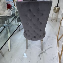 Silver and gray dining room chairs