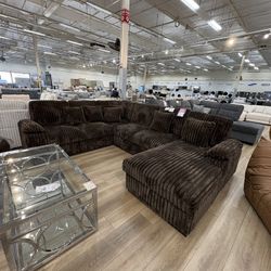 LARGE CHOCOLATE CORDUROY SECTIONAL WITH PULL OUT SLEEPER AND STORAGE CHAISE