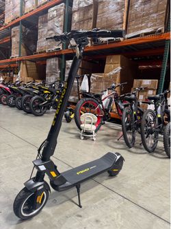 High-end electric scooter with front and rear shock absorption