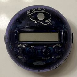 Radica 20Q Twenty Questions Handheld Electronic Game Purple