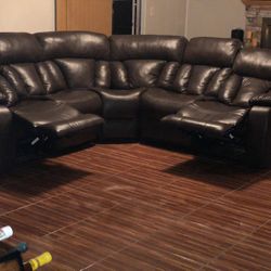 Sectional sofa with two reclining chairs