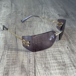 Miu Miu Sunglasses Purple Lens