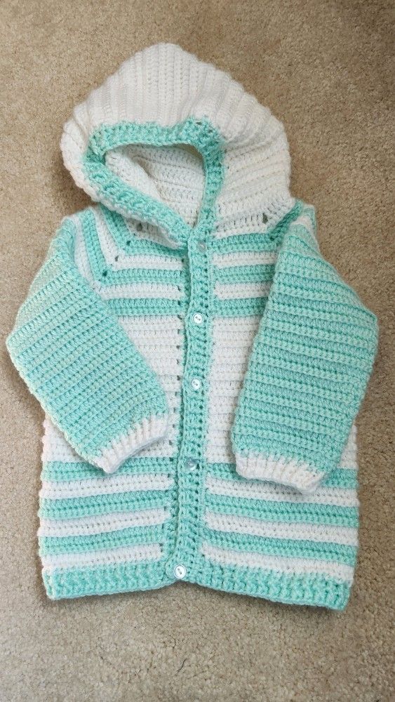 Crocheted Baby Sweater With Overalls And Hat