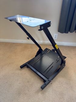 Racing sim wheel and pedal stand