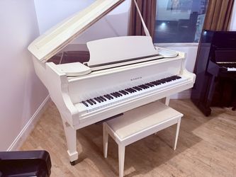 White Baby Grand Piano