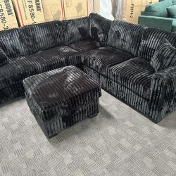 Black  L shaped sectional w/ ottoman