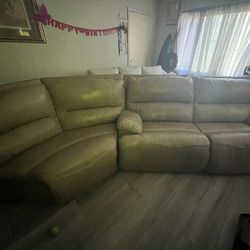 2 light brown piece leather couches