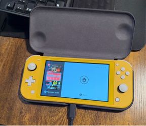 Yellow Nintendo Switch Lite with case