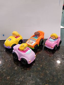 Four Fisher-Price raceway cars hard to find new condition cash only please