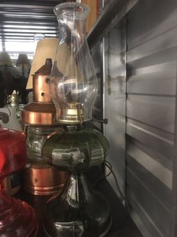 Antique green oil lamp