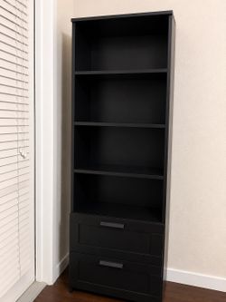 Black tall IKEA bookshelf