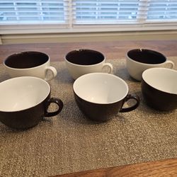 Set Of Brown And White Mugs