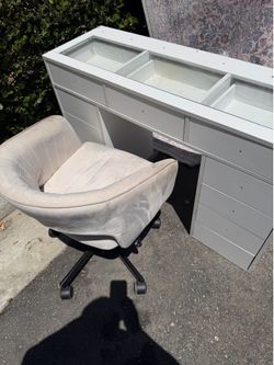 Desk w/ drawers, electrical wiring, and glass top with chair